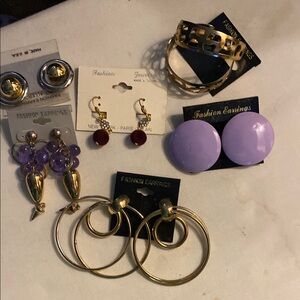 Costume jewelry. Gold and Purple Fashion Earrings Set